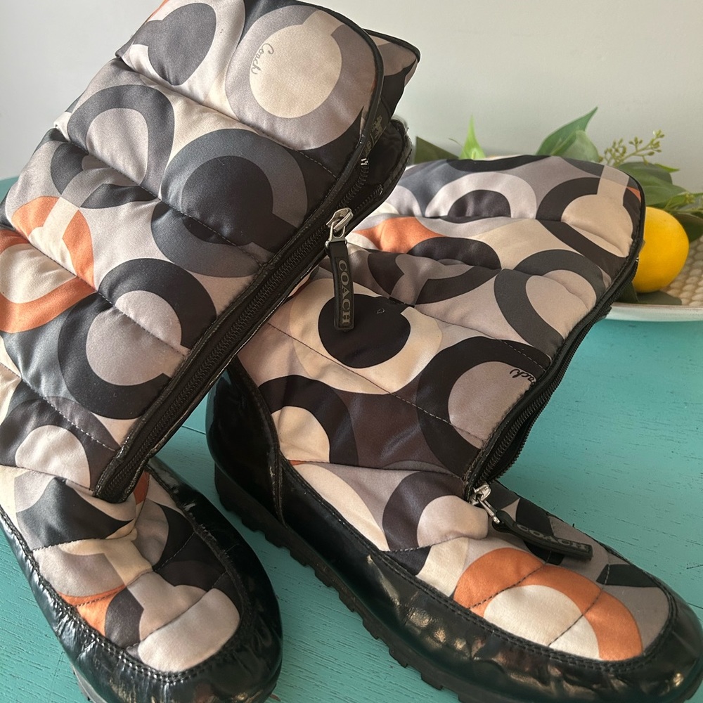 Women’s size 9 vibrant Coach boots. Colorful design and comfortable to wear.